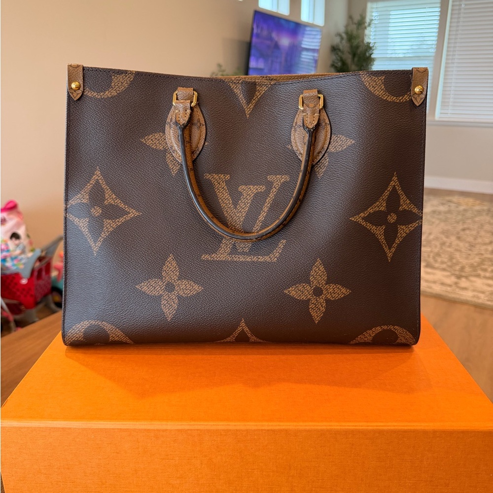 SOLD Authentic Louis Vuitton On The Go MM Reverse Monogram